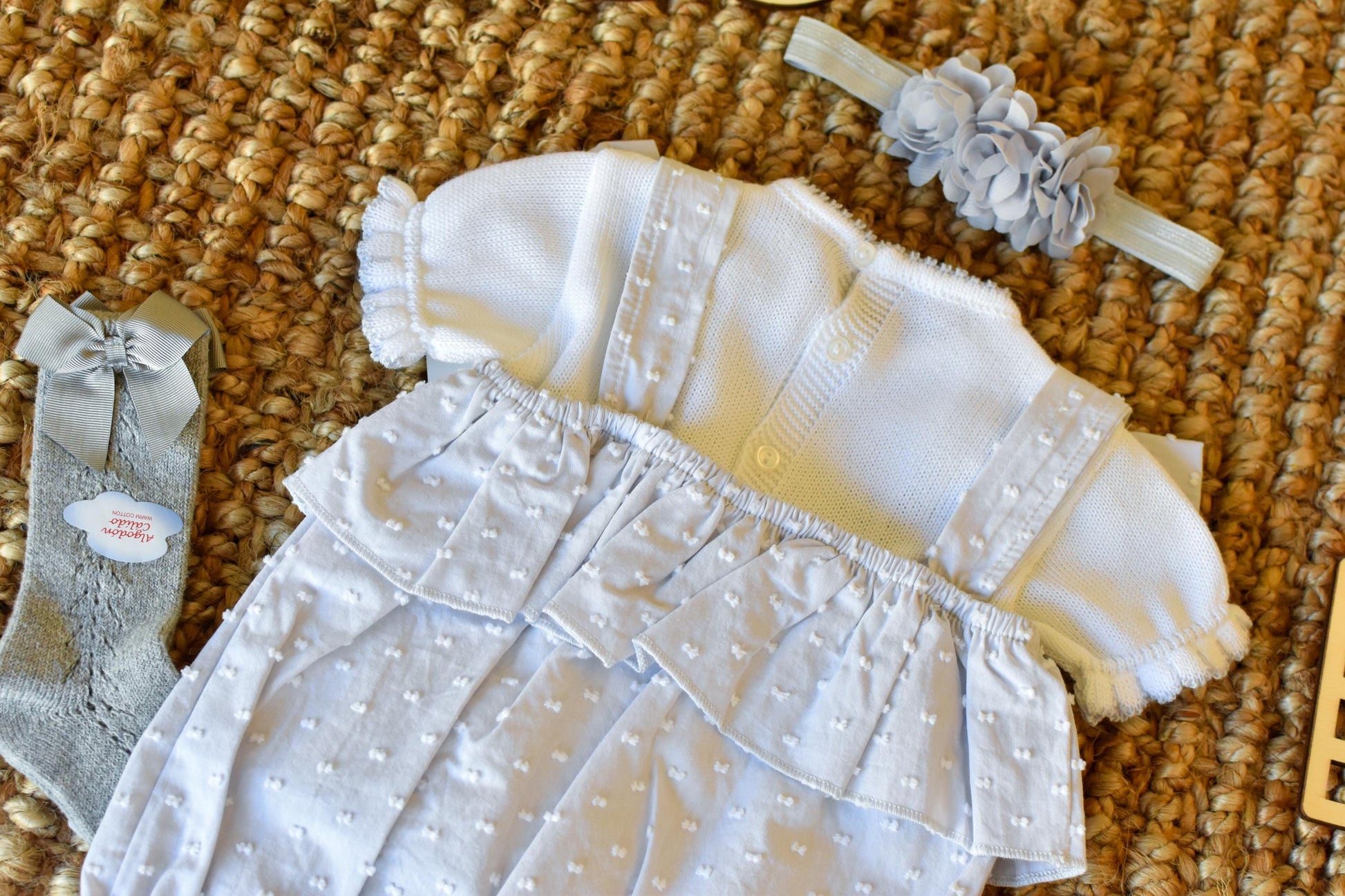 Peto knit with bows and Swiss fabric in Grey