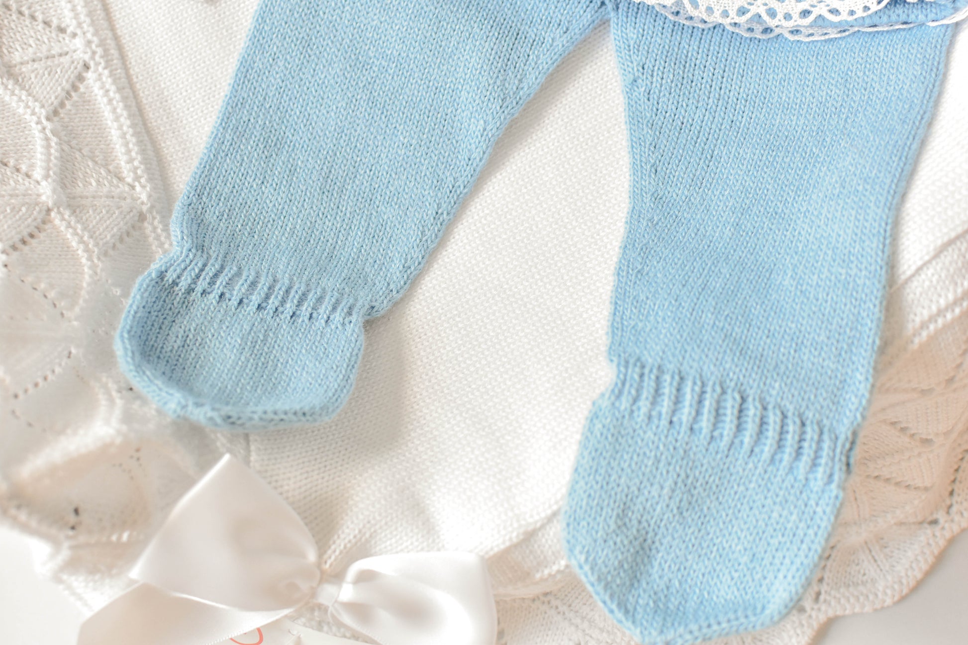 Knitted Pom Pom with Lace Trim in Blue - White