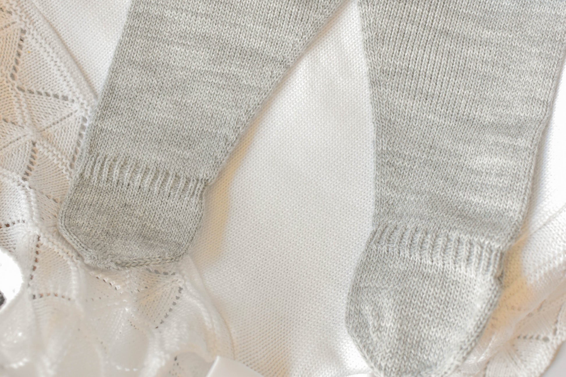 Knitted Pom Pom with Lace Trim in Grey