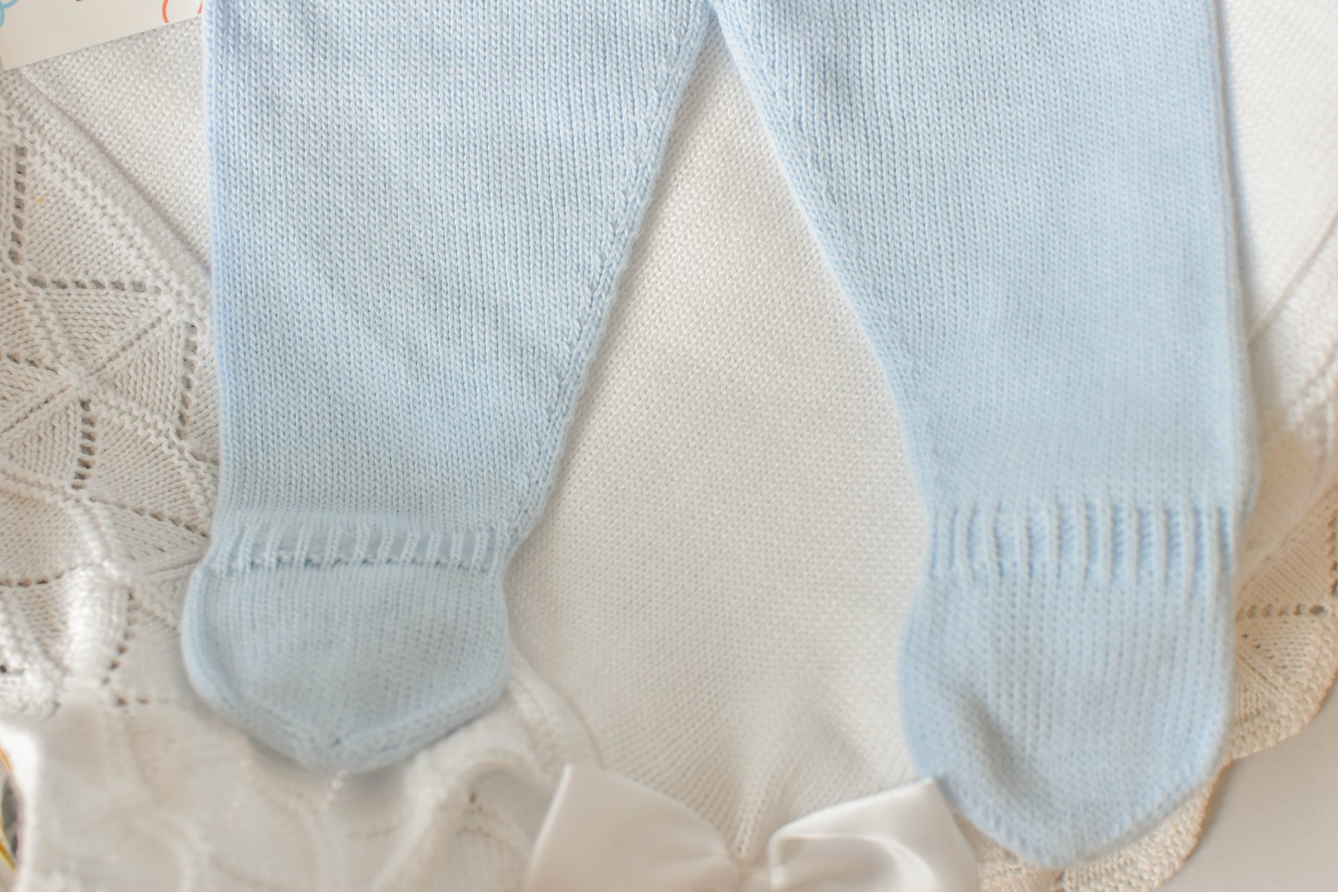 Knitted Pom Pom with Lace Trim in Sky Blue - White