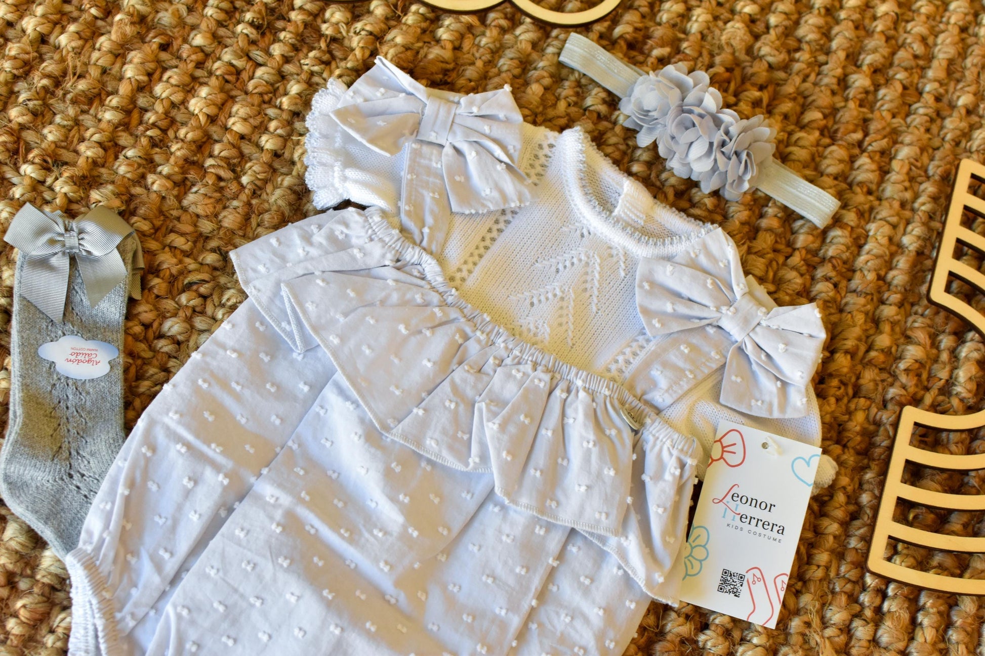 Peto knit with bows and Swiss fabric in Grey