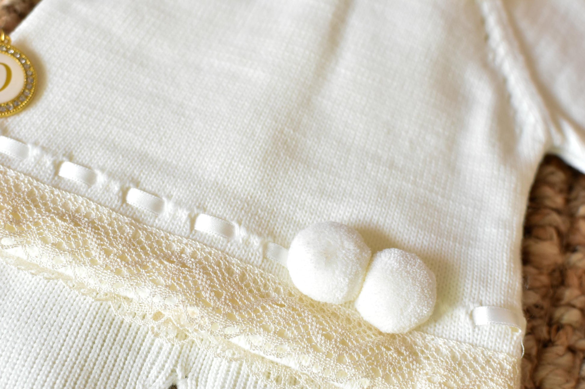 Knitted Pom Pom with lace trim in White - Beige