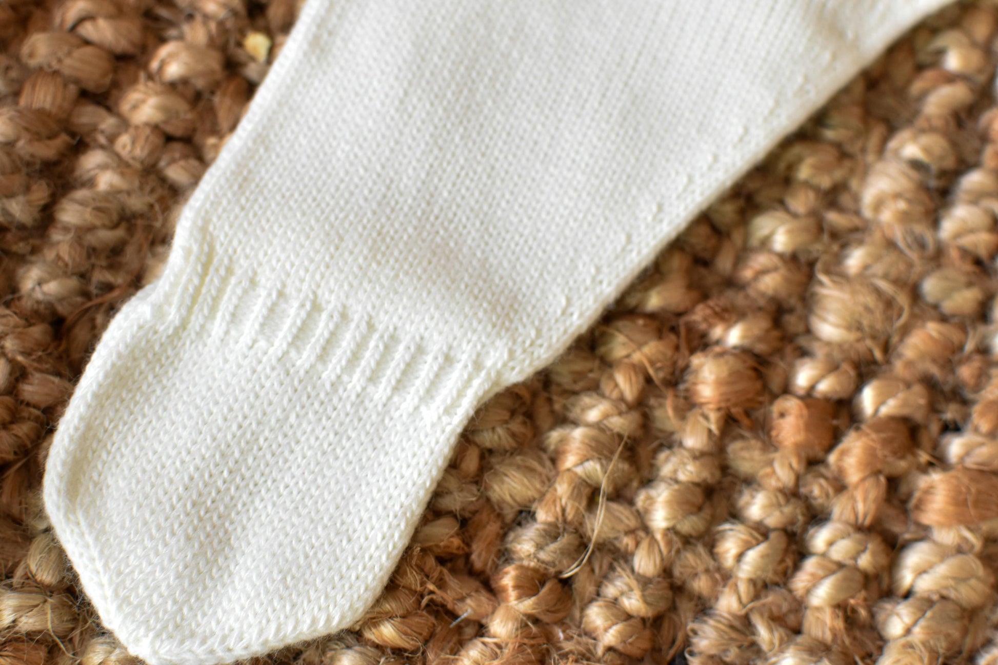 Knitted Pom Pom with lace trim in White - Beige