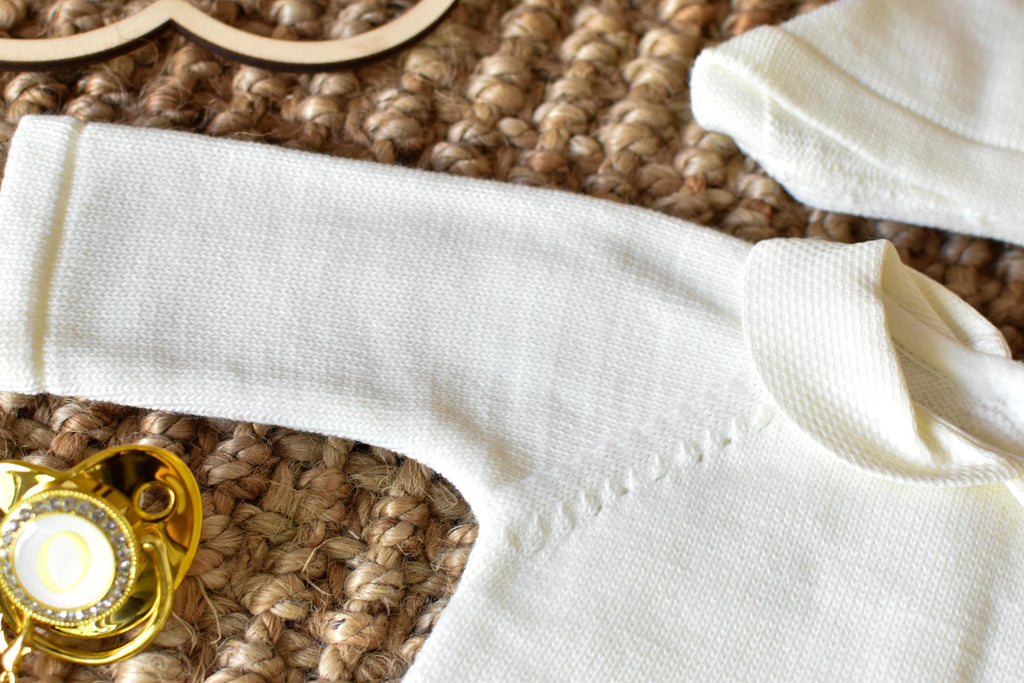 Knitted Pom Pom with lace trim in White - Beige