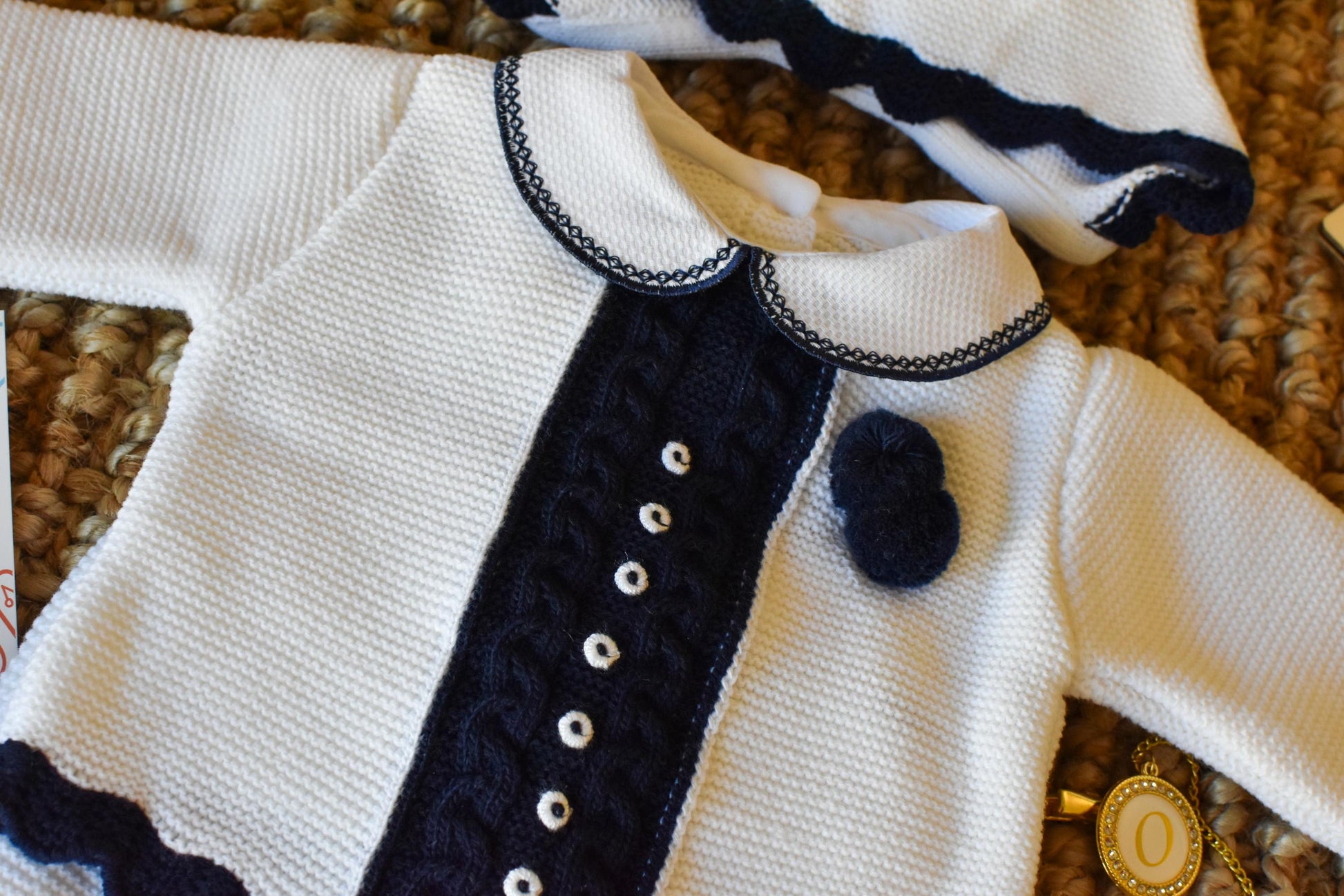 Knit Cable with Pom Pom in White - Old Blue