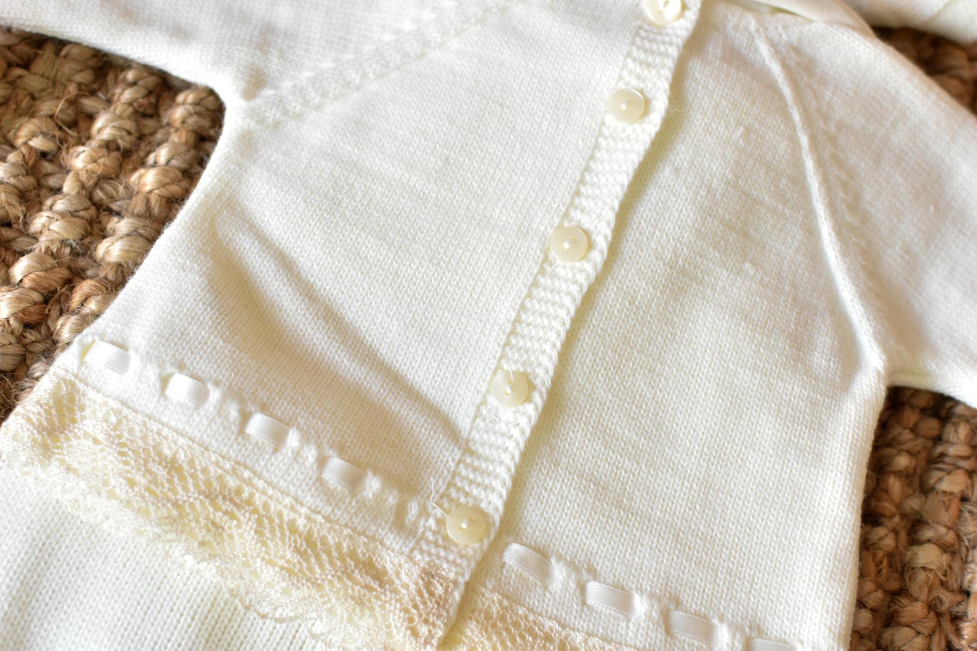 Knitted Pom Pom with lace trim in White - Beige