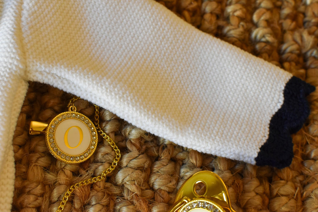 Knit Cable with Pom Pom in White - Old Blue