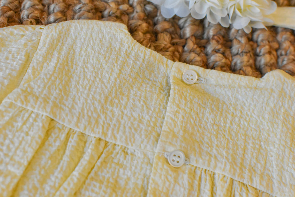 Peto details with socks and Bow in light Yellow